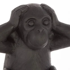 Estatueta macaco sábio surdo