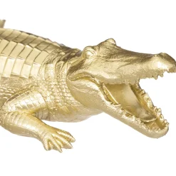 Estátua crocodilo dourado