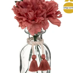 Jarra de vidro com flores artificiais