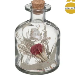 Jarra de vidro com flores secas