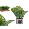 Planta artificial verde com vaso de metal