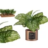 Planta artificial verde com vaso de metal